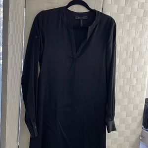 Long sleeve black BCBG dress.